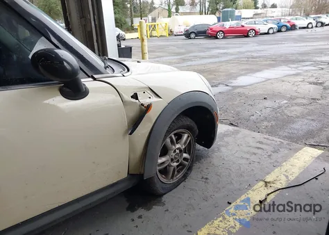 2012 Mini Cooper z USA, uszkodzony, nr VIN WMWSU3C51CT542746